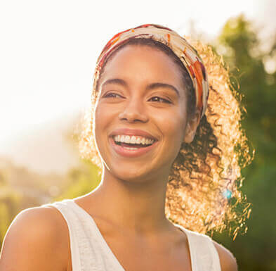 Young attractive woman smiling at camera