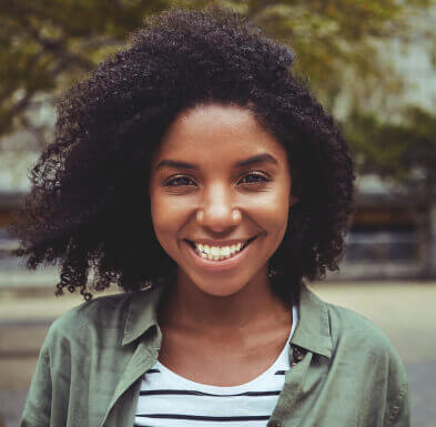Smiling young woman without eye glasses
